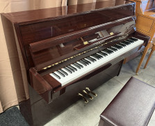 Yamaha contemporary-style piano in polished mahogany